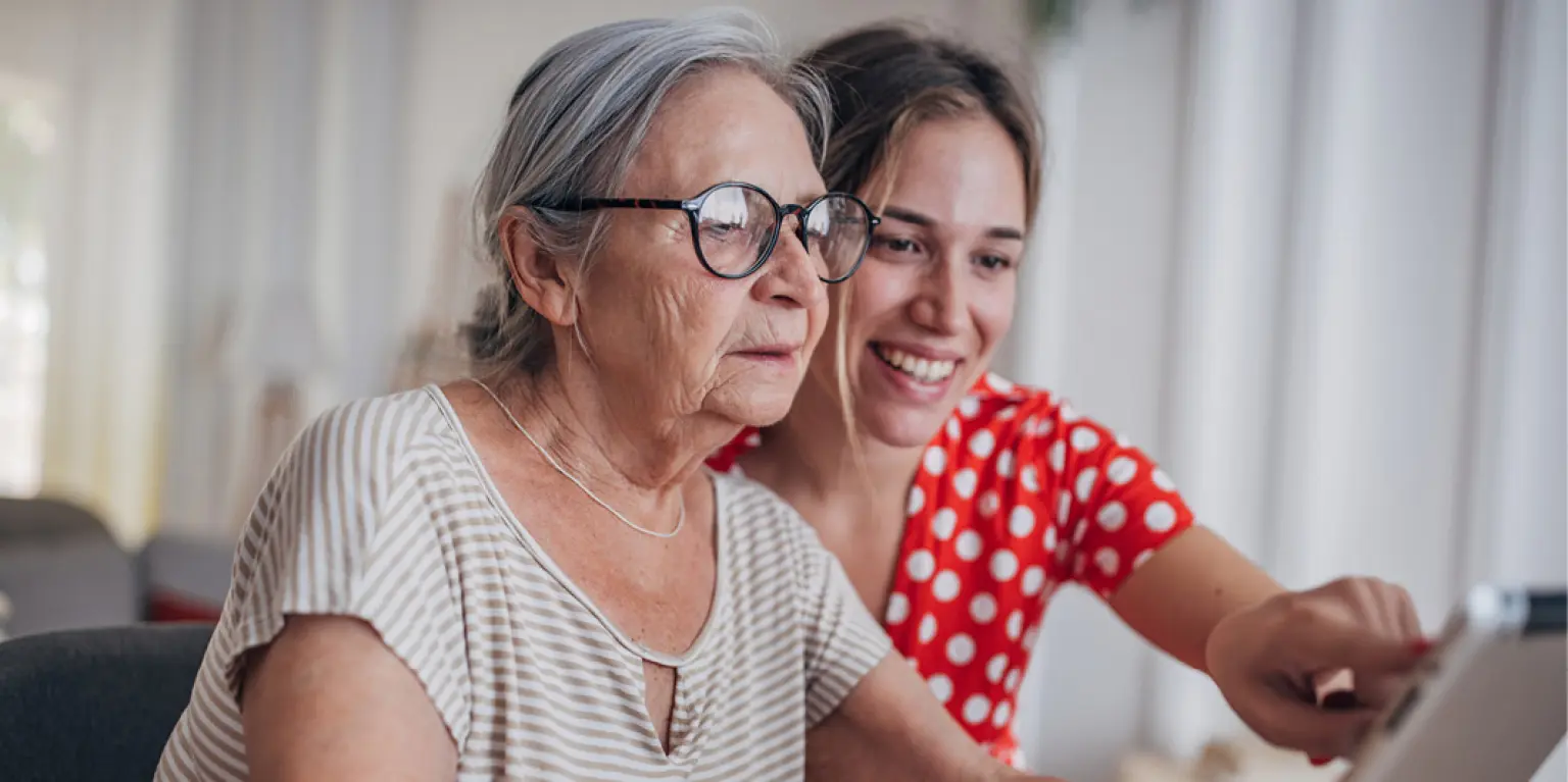 younger person helping older relative