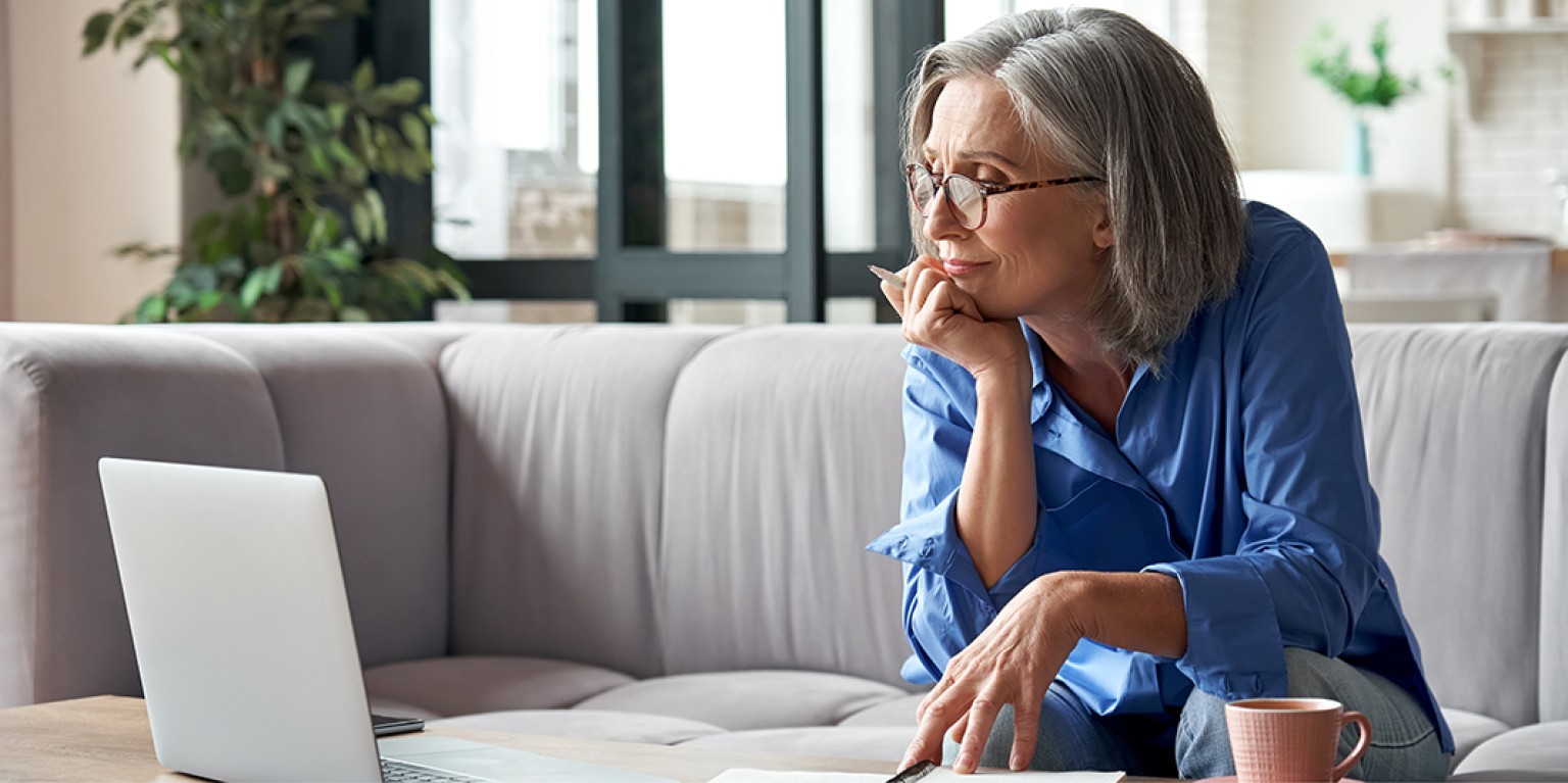 woman looking at a computer