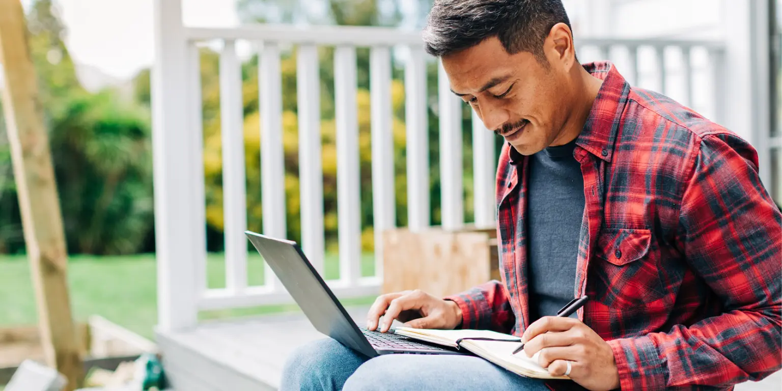 A man is checking his kiwisaver account