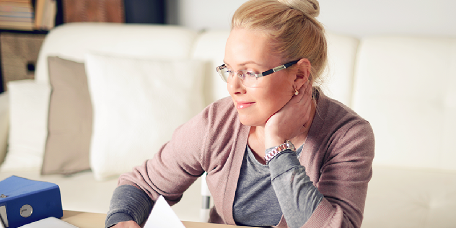 a woman writing her statement of wishes