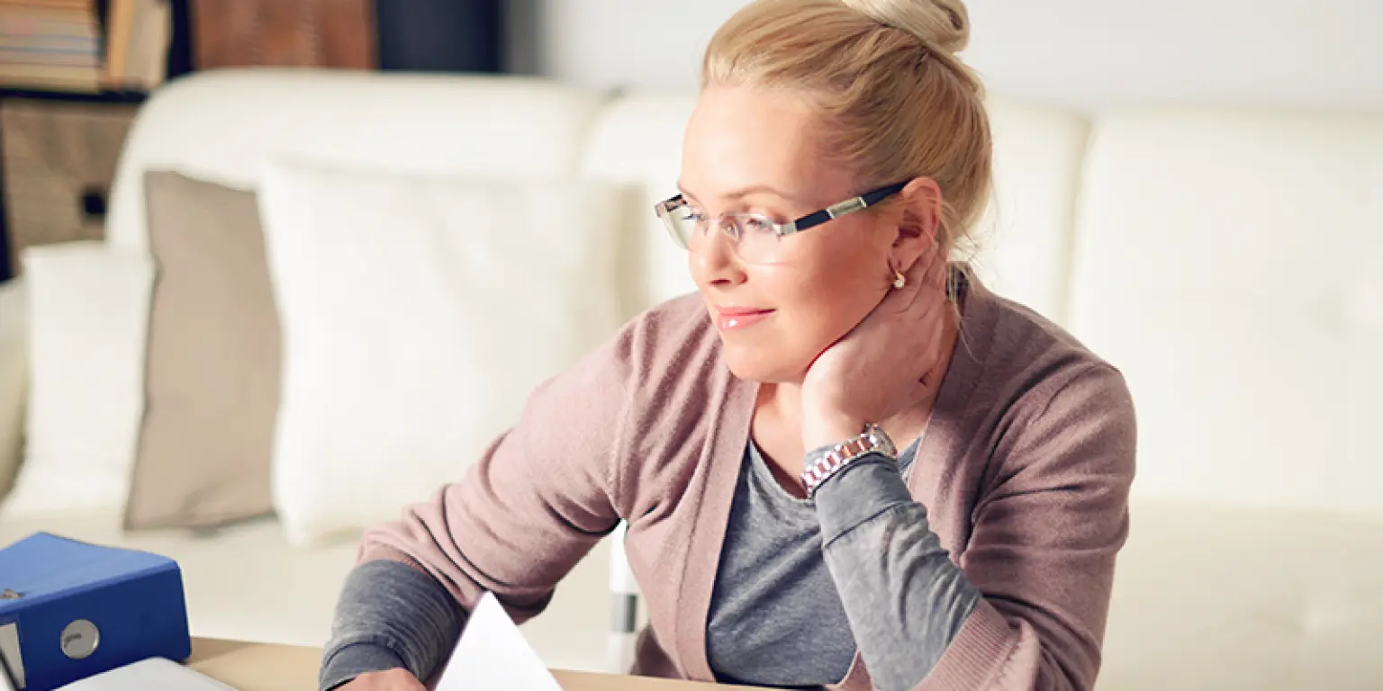 a woman writing her statement of wishes
