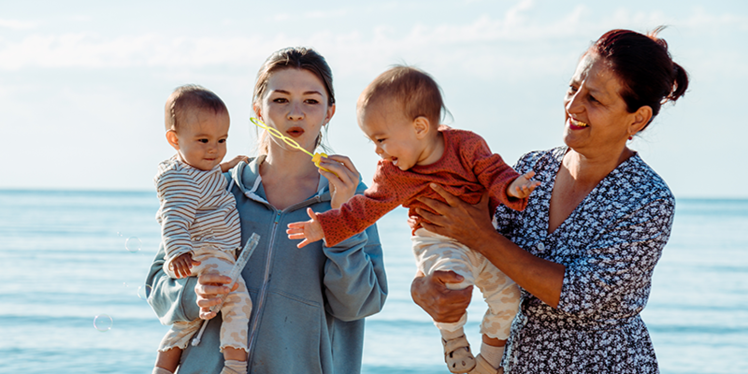 family enjoying time at the beach