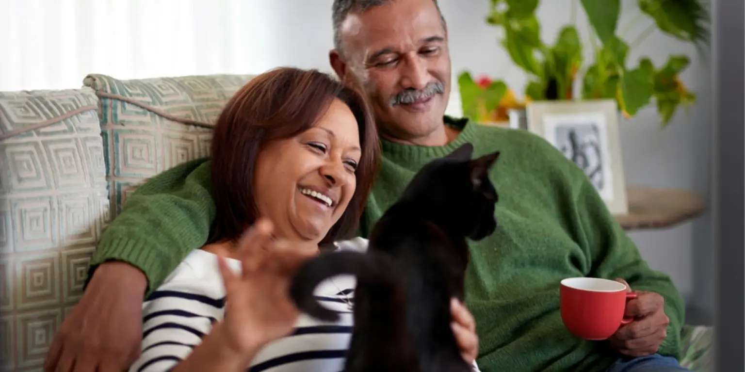 couple with their cat